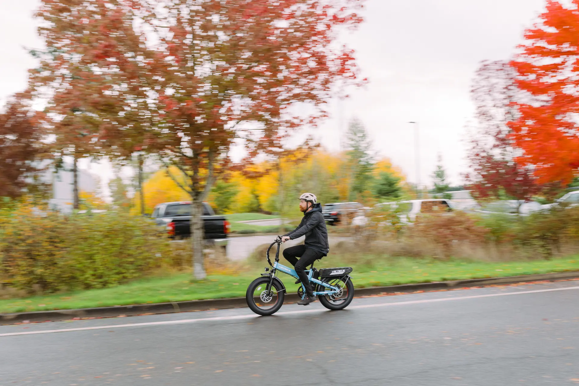 Man Riding fat tire folding electric bike