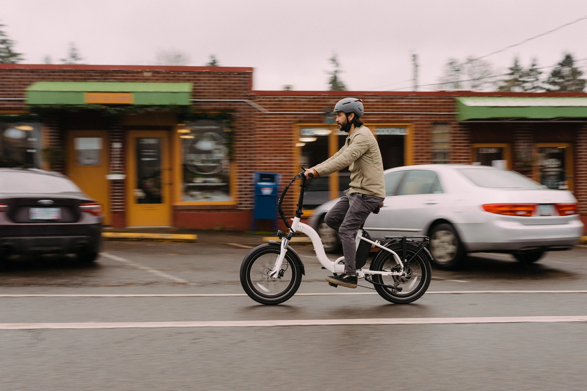 Person riding bike to the left